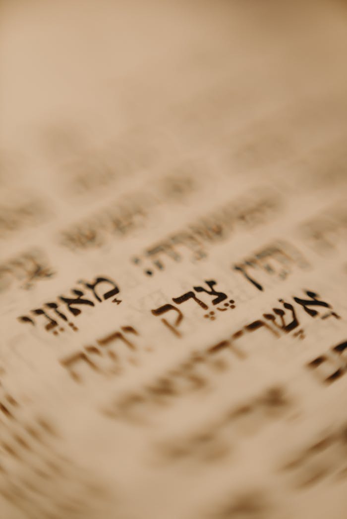 creative-03 A detailed close-up of Hebrew text on a traditional religious document, emphasizing cultural significance.